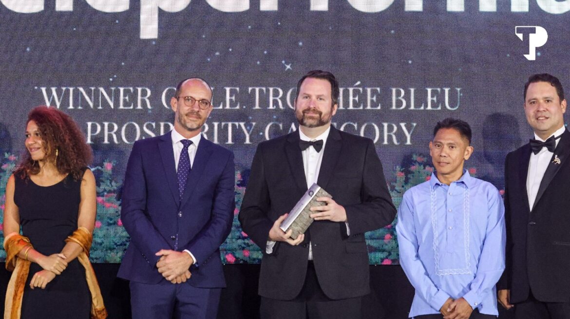 Pierre Berube, Senior Vice President for Shared Services and Capability Development (middle), receives the Prosperity Award on behalf of Teleperformance. Several flagship programs of Teleperformance in the Philippines for inclusivity and sustainability include the revolutionary remote work solution, TP Cloud Campus; the inclusive talent-sourcing program of TP for All; and the TP Skills Training to Employment Program (TP STEP) which equips marginalized groups with the competencies they need to thrive in the IT-BPM industry.