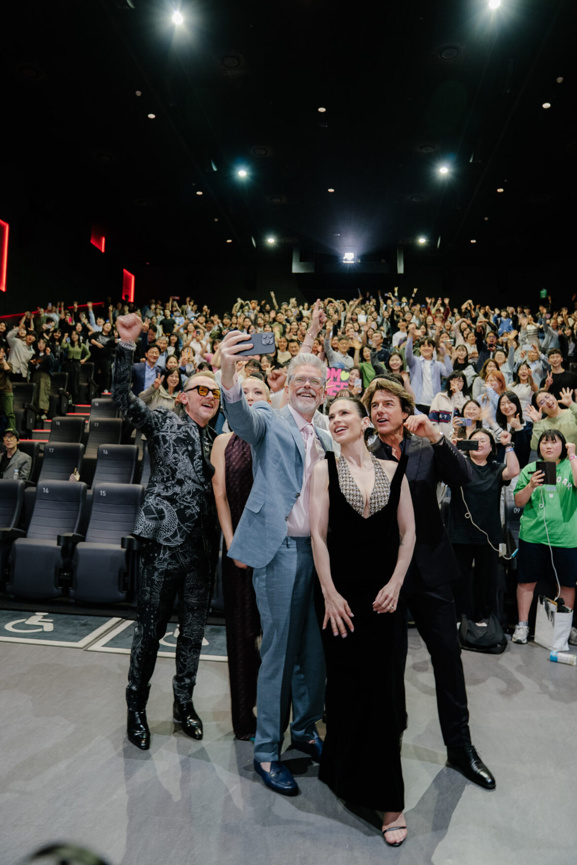 (From left) Simon Pegg, Pom Klementieff, director Christopher McQuarrie, Hayley Atwell and Tom Cruise take a selfie inside the theater at the Seoul red carpet premiere of Mission: Impossible – The Final Reckoning on May 8. | Photo from Paramount Pictures (From left) Simon Pegg, Pom Klementieff, director Christopher McQuarrie, Hayley Atwell and Tom Cruise take a selfie inside the theater at the Seoul red carpet premiere of Mission: Impossible - The Final Reckoning on May 8. | Photo from Paramount Pictures