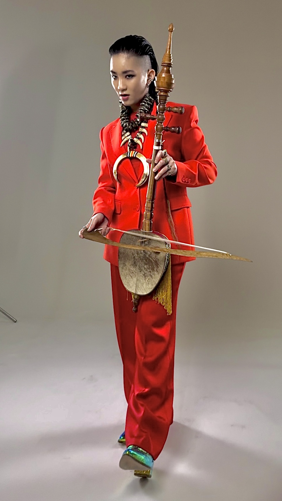 Sisoski holding a "Rebab" from Kelantan, Malaysia | Photo from Belle Sisoski