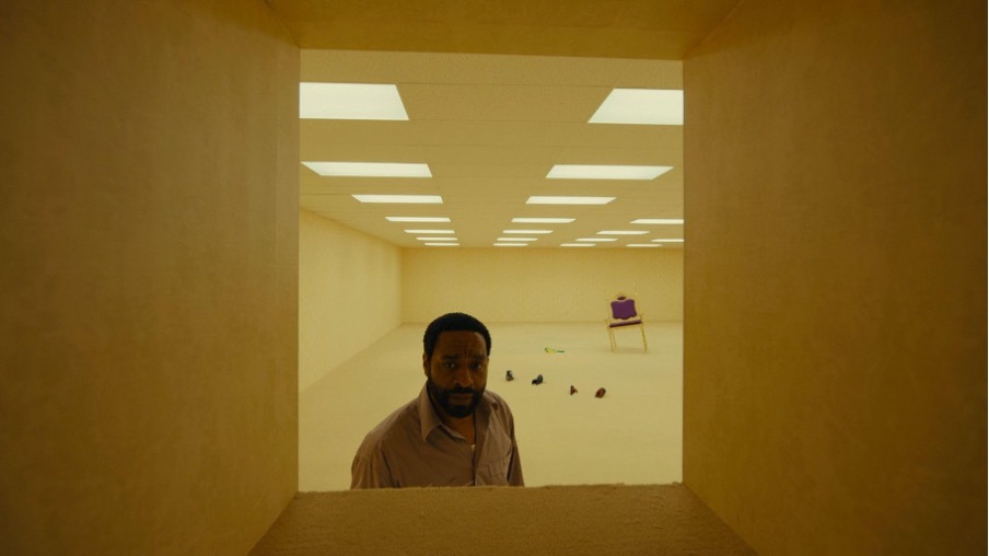 Chiwetel Ejiofor plays Clark, a failed architect and furniture store owner who finds a doorway to the Backrooms in his store’s basement | Still from A24